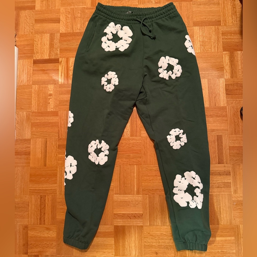 Denim Tears Dark Green Joggers with White Floral Design